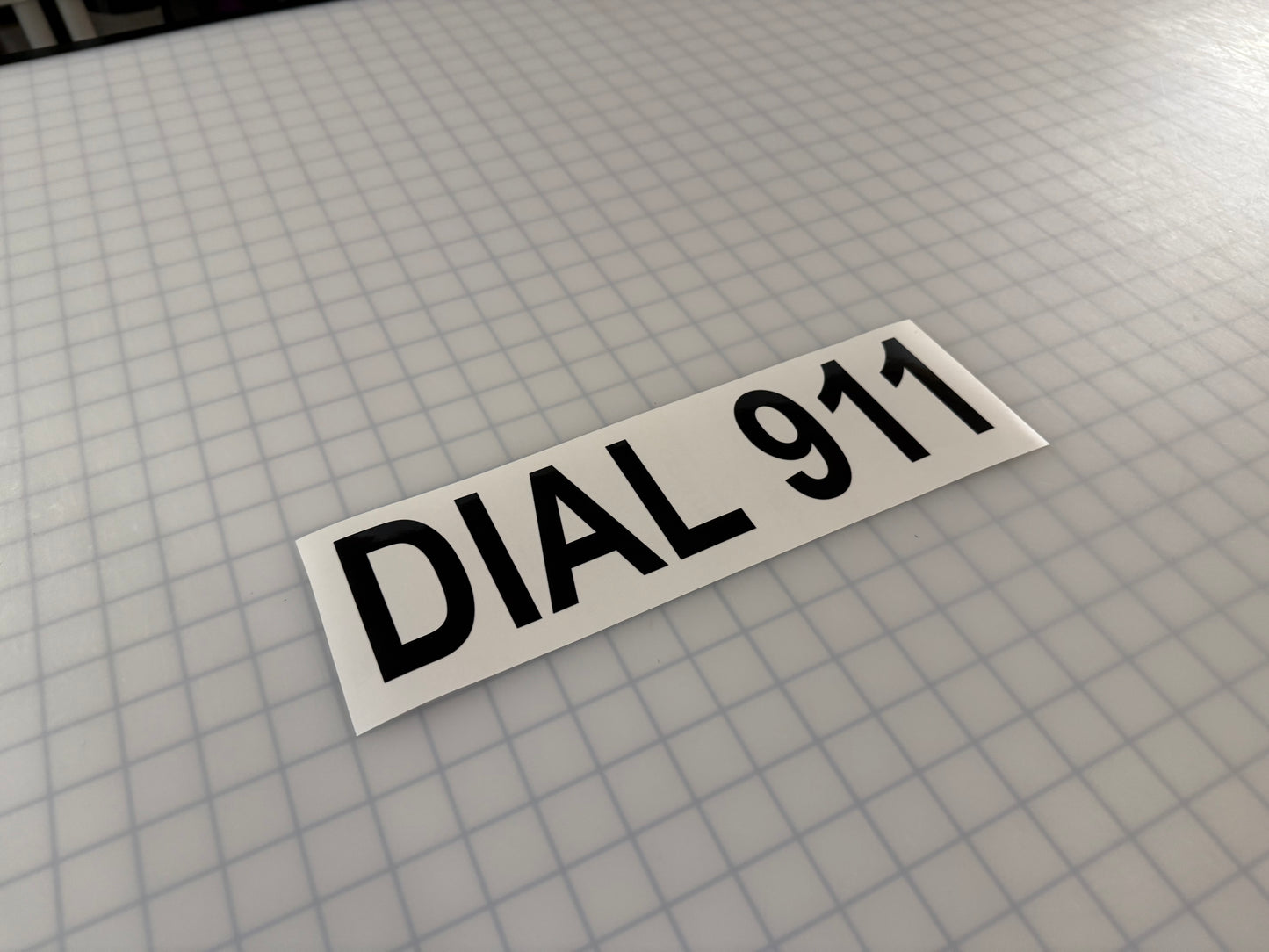 "DIAL 911" 3"x12" Reflective Decal Bold
